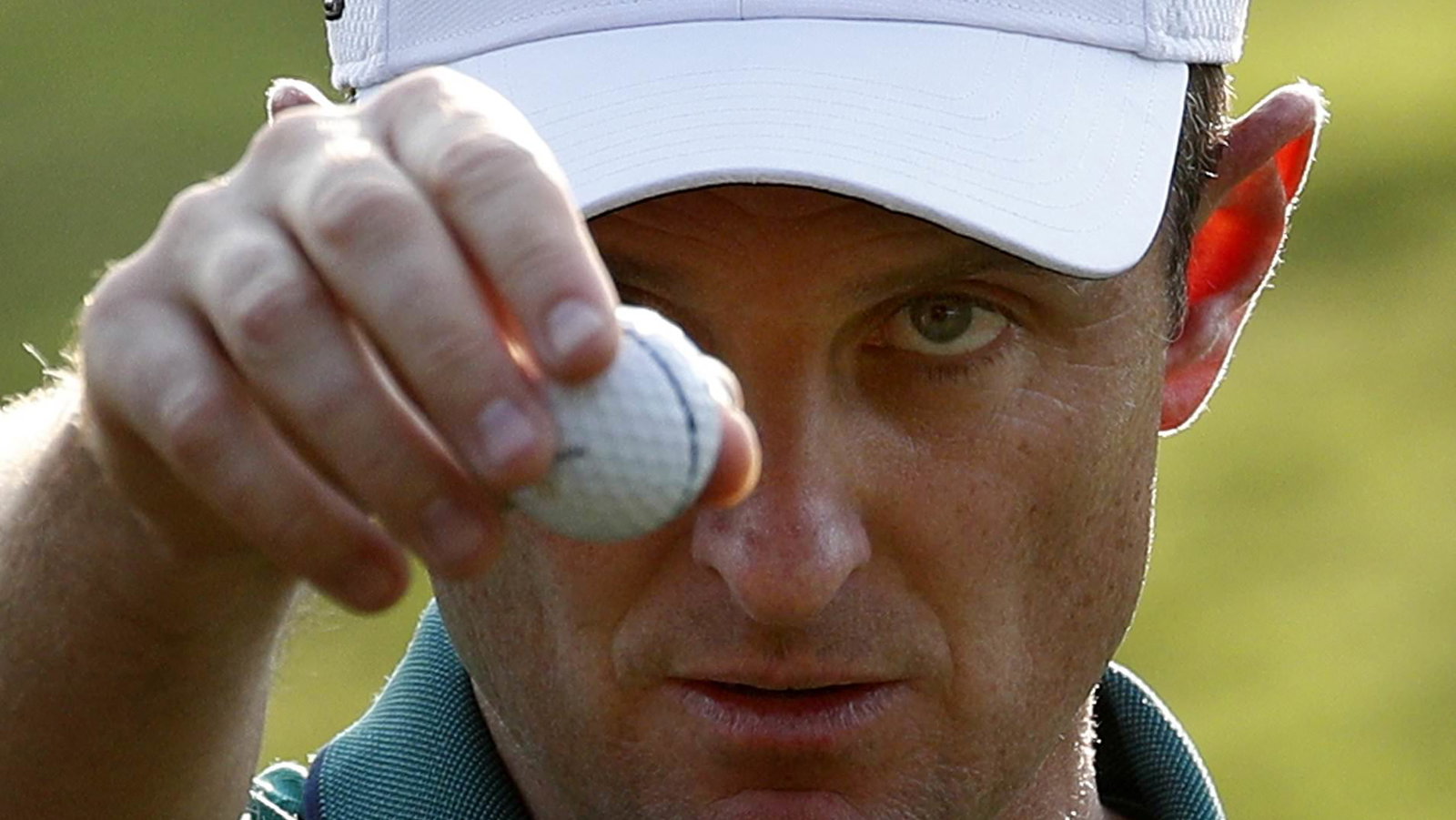 Louis Oosthuizen and Justin Rose contend for shot of the round